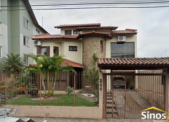 Linda casa com 04 dormitórios no bairro Padre Réus